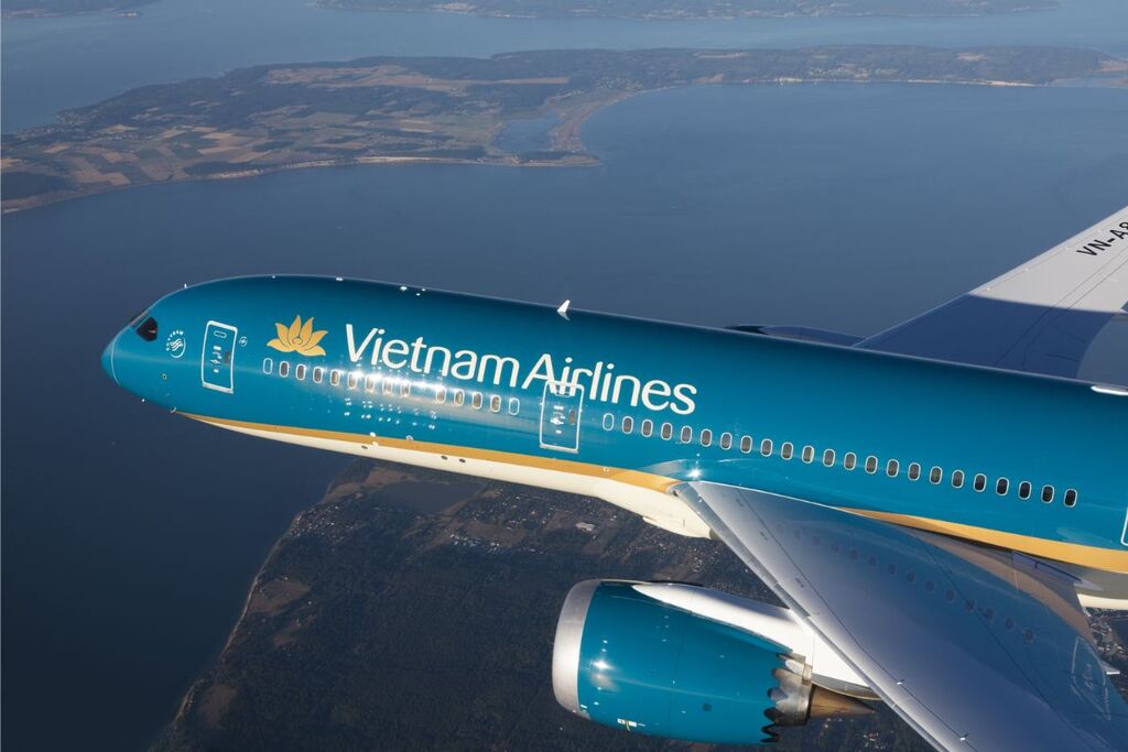 Vietnam Airlines jet flying over the coast of Vietnam