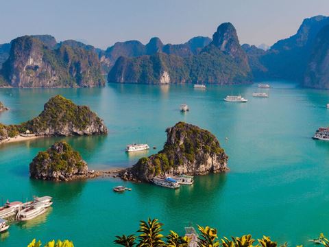 Day 8: Hanoi to Ha Long Bay: aboard Le Journey Cruise for kayaks, a cave, a swim and a spring-roll lesson at sunset