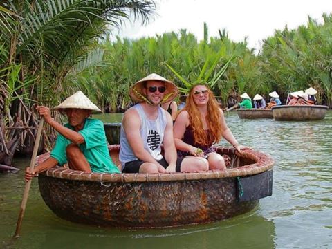 Day 2: Hoi An Market with the chef, basket boats at Cam Thanh and a seven-dish cooking class, then the Marble Mountains and Son Tra