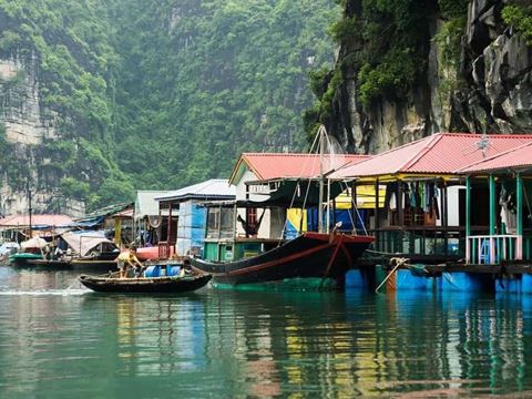 Day 4: Morning on the bay at a floating fishing village, then fly to Ho Chi Minh City