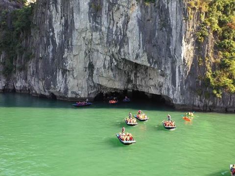 Day 8: Drive to Ha Long Bay and board the cruise: Surprise Cave, kayaks and a sunset on deck